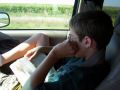 Hunter reads Lord of the Rings as he readies for school.jpg